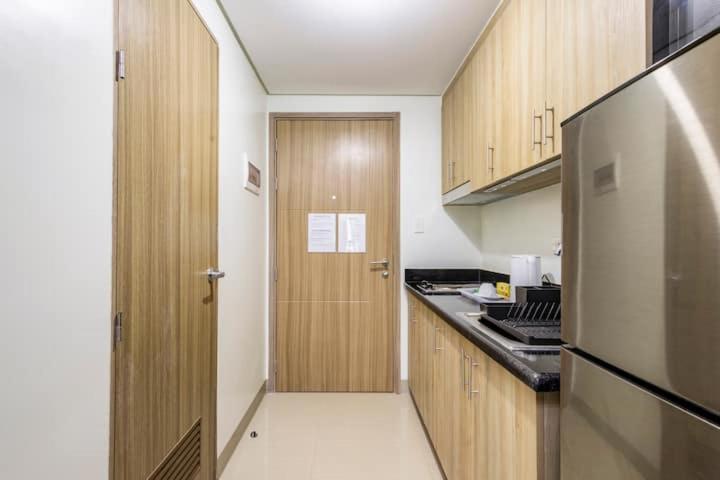 Shore 2 Residences 1Br Deluxe Room In Moa Complex Manila Esterno foto